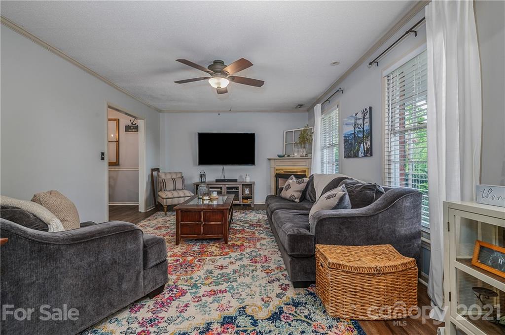 137 Anne Street Rutherfordton, NC 28139 - Photo 5 of 45 a living room with furniture and a flat screen tv
