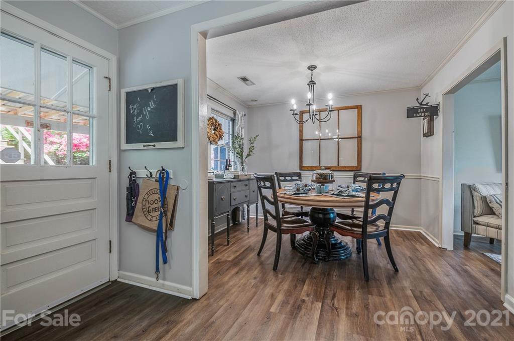 137 Anne Street Rutherfordton, NC 28139 - Photo 7 of 45 a view of a dining room with furniture window and wooden floor