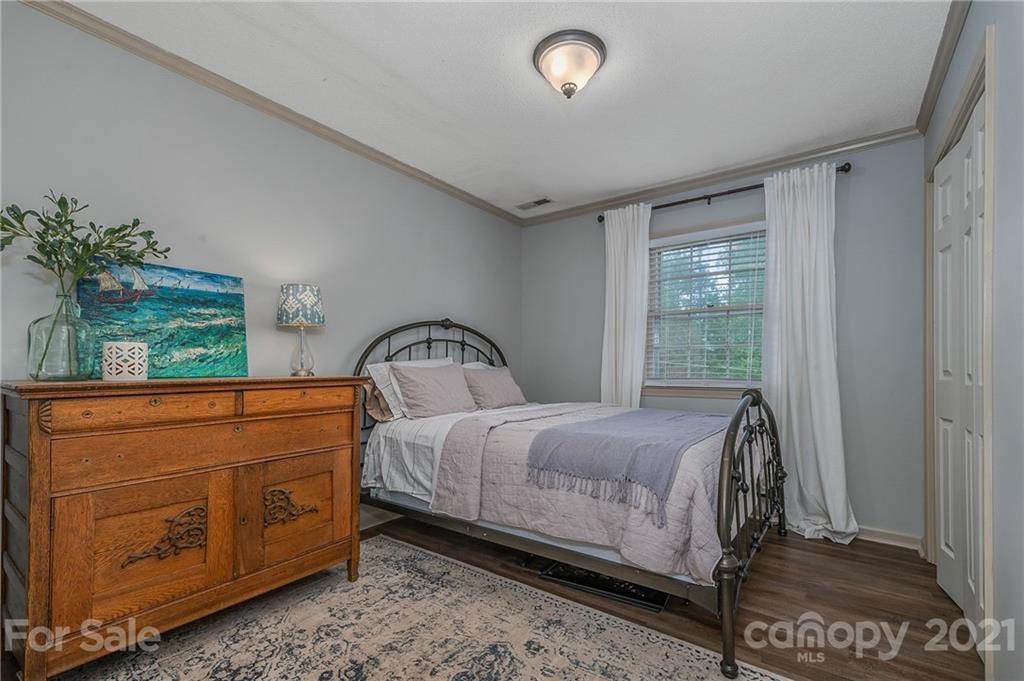 137 Anne Street Rutherfordton, NC 28139 - Photo 10 of 45 a bedroom with a bed and a window