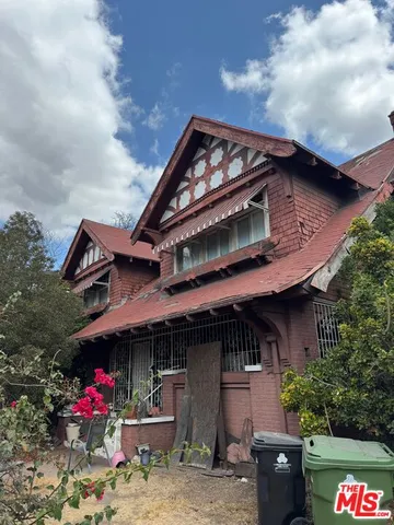 a front view of a house with an outdoor space