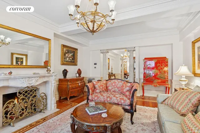 a room with lots of gym equipment and view of living room