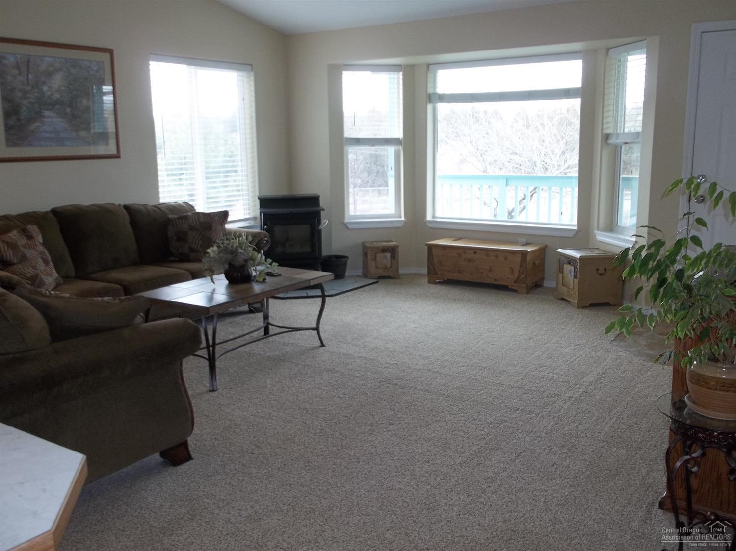 9367 Southwest Panorama Road Terrebonne, OR 97760 - Photo 4 of 20 Light and bright living room with cozy p