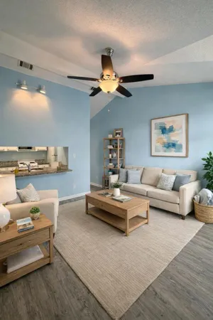 a living room with furniture and view