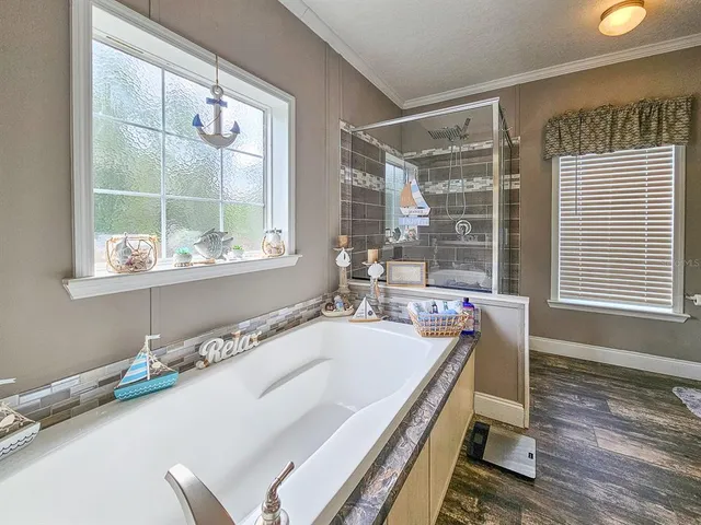 a bedroom with a bed and a desk