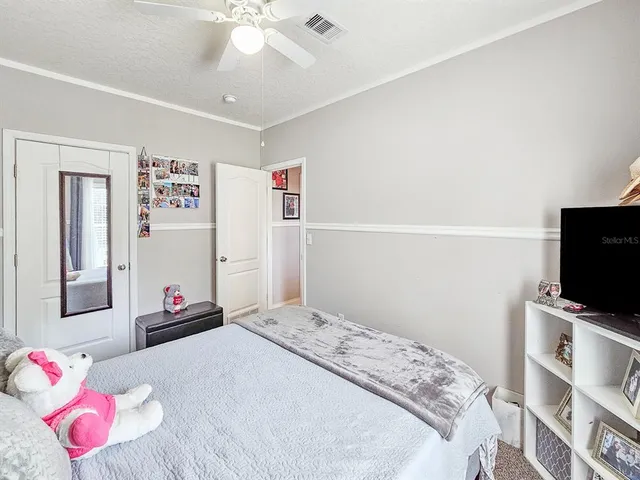 a view of a backyard with sitting area