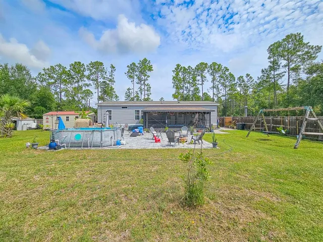 a view of an outdoor space and a yard