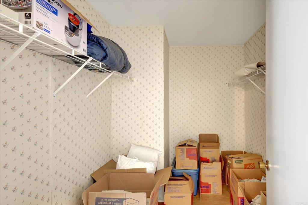 205 Mockingbird Lane Oceanside, CA 92057 - Photo 22 of 28 a bathroom with a toilet and a sink
