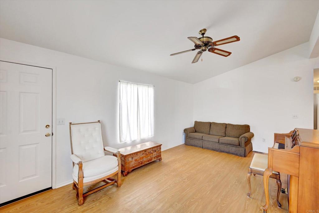 205 Mockingbird Lane Oceanside, CA 92057 - Photo 5 of 28 a living room with furniture and a window
