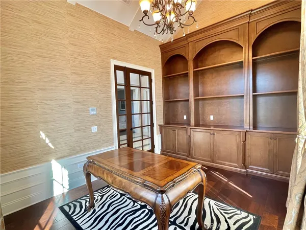 a view of a livingroom with furniture and chandelier