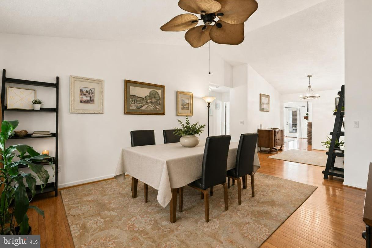 12345 H G Trueman Road Lusby, MD 20657 - Photo 11 of 38 a view of a dining room with furniture and wooden floor