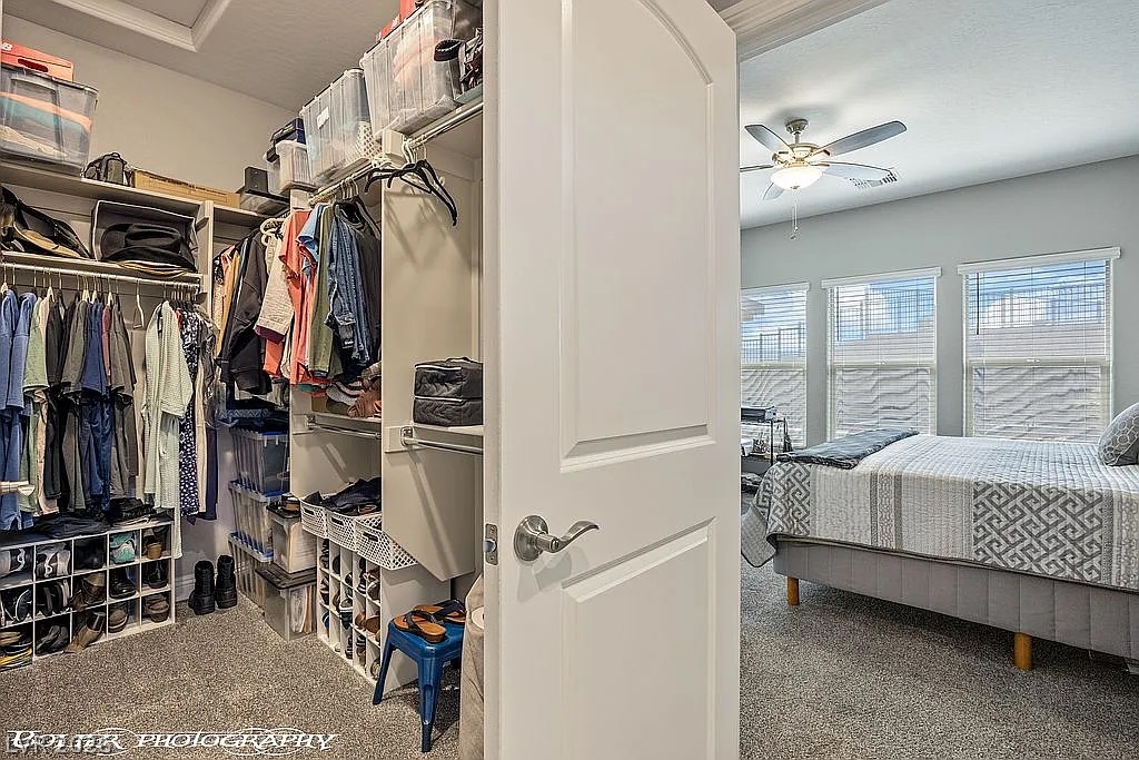 1304 Cottage Ridge Mesquite, NV 89034 - Photo 18 of 52 Step inside this organized walk-in closet featuring ample storage, directly accessible from a light-filled bedroom.