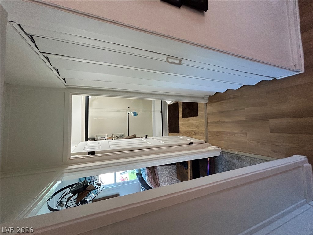116 West Basic Road Henderson, NV 89015 - Photo 27 of 39 Discover a unique perspective with this cleverly designed attic access leading to functional living areas below.