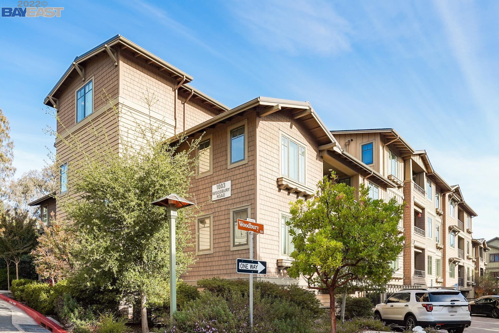 1003 Woodbury Road, Unit 207 Lafayette, CA 94549 - Photo 1 of 1 a view of a building with a street