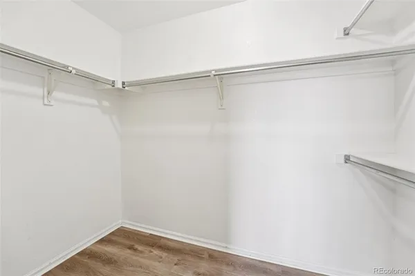 a view of a room with racks on the wall