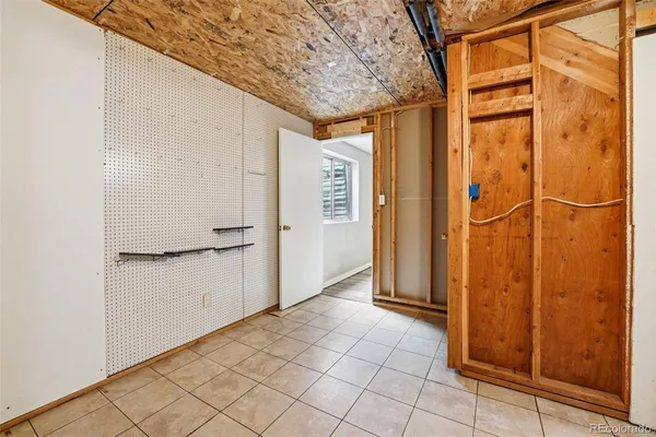 a view of walk in closet with window