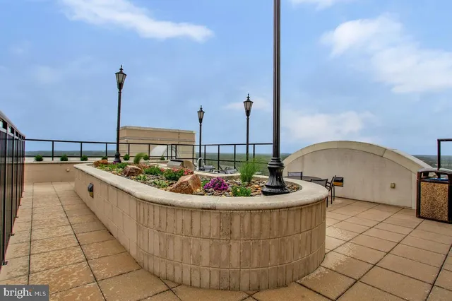 a view of a swimming pool with a terrace