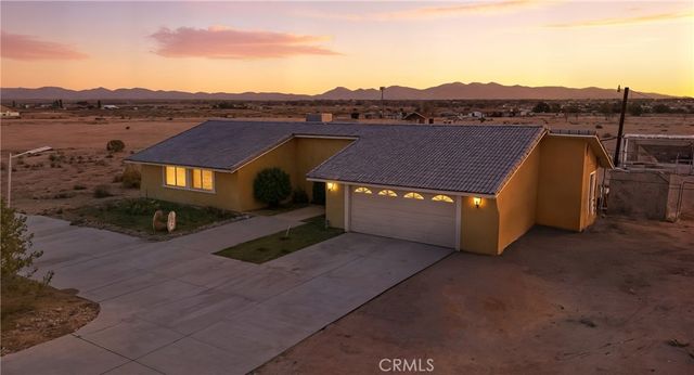 a view of a terrace with a garden