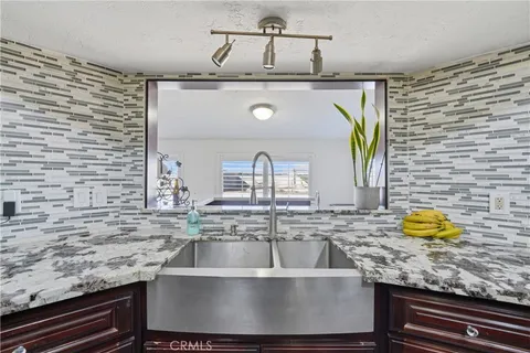 a view of a sink a counter top space