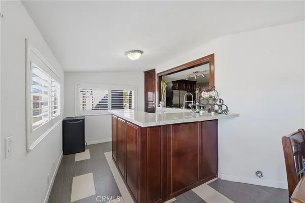 a view of kitchen with wooden floor