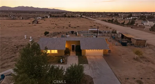 a view of a city with mountains in the background