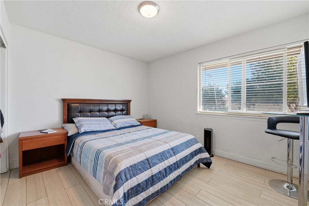 10080 Deep Creek Road Apple Valley, CA 92308 - Photo 25 of 36 a bedroom with a bed and a window