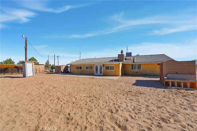 a front view of a house with large space