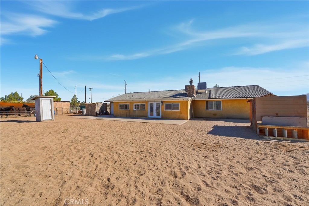 10080 Deep Creek Road Apple Valley, CA 92308 - Photo 29 of 36 a front view of a house with large space