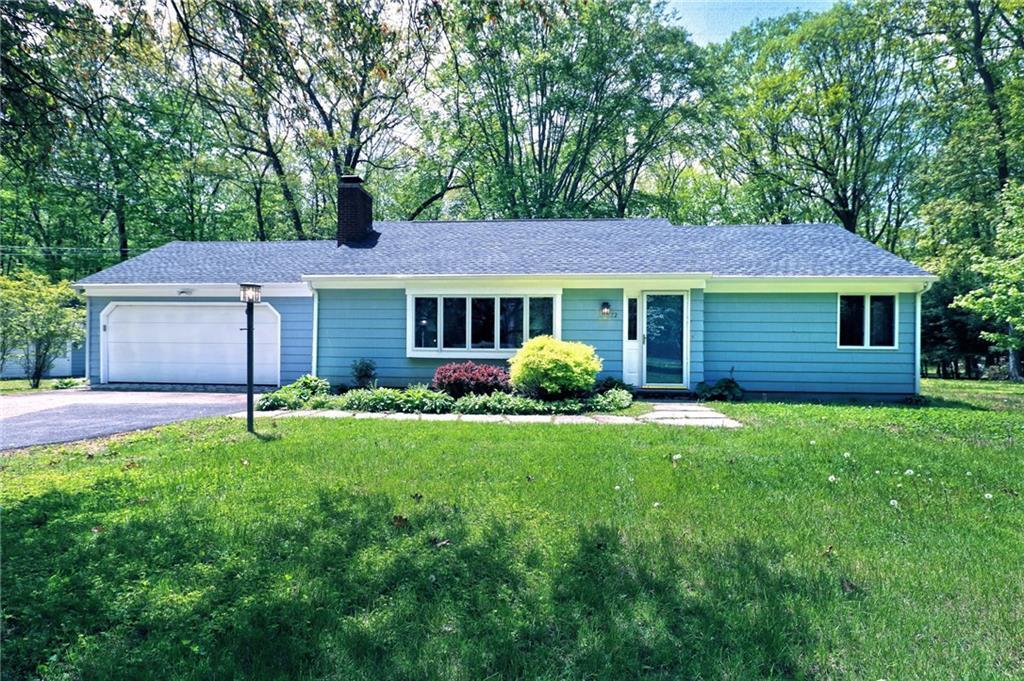 72 Northrop Road Woodbridge, CT 06525 - Photo 1 of 1 a house that has a garden