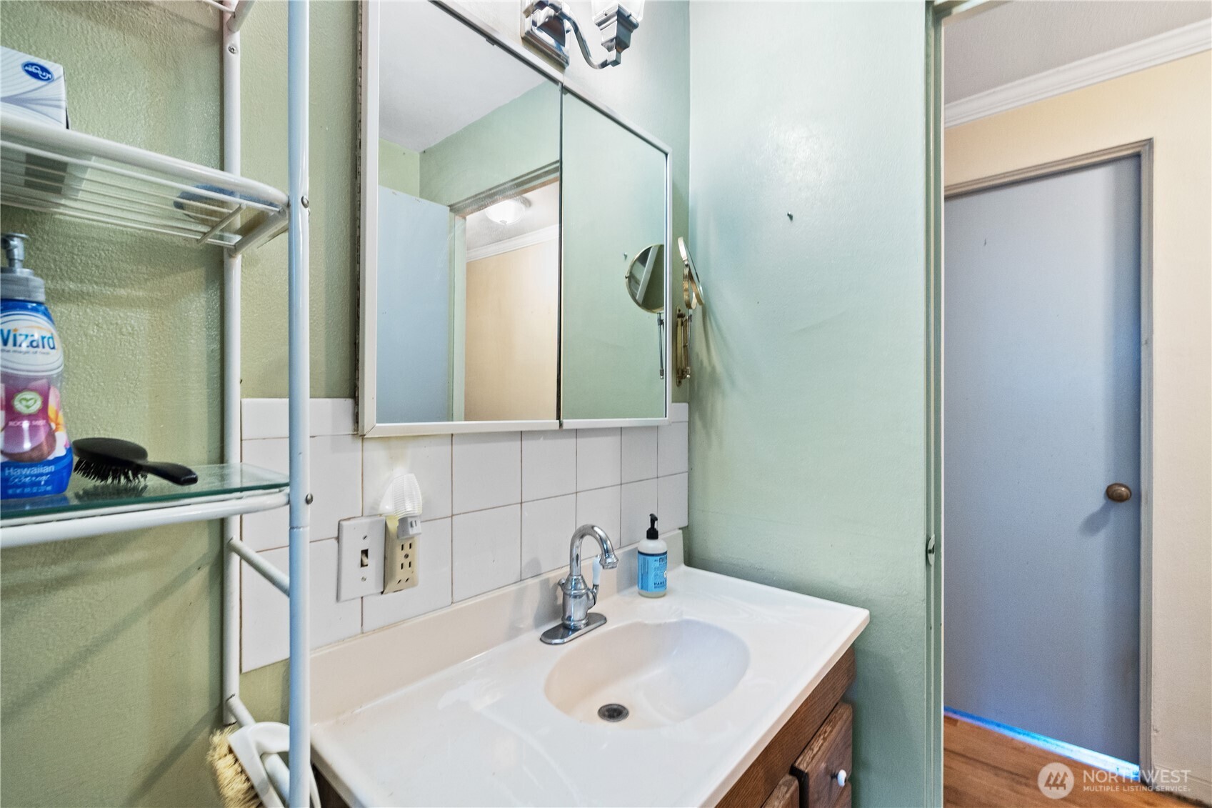 105 Northeast 180th Street Shoreline, WA 98155 - Photo 12 of 34 a bathroom with a sink a toilet and shower
