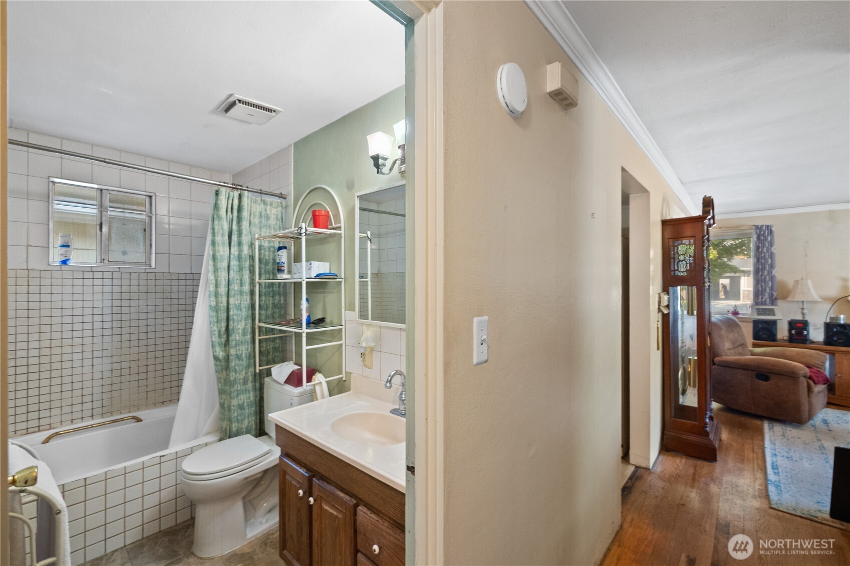 105 Northeast 180th Street Shoreline, WA 98155 - Photo 13 of 34 a bathroom with a sink a toilet and shower