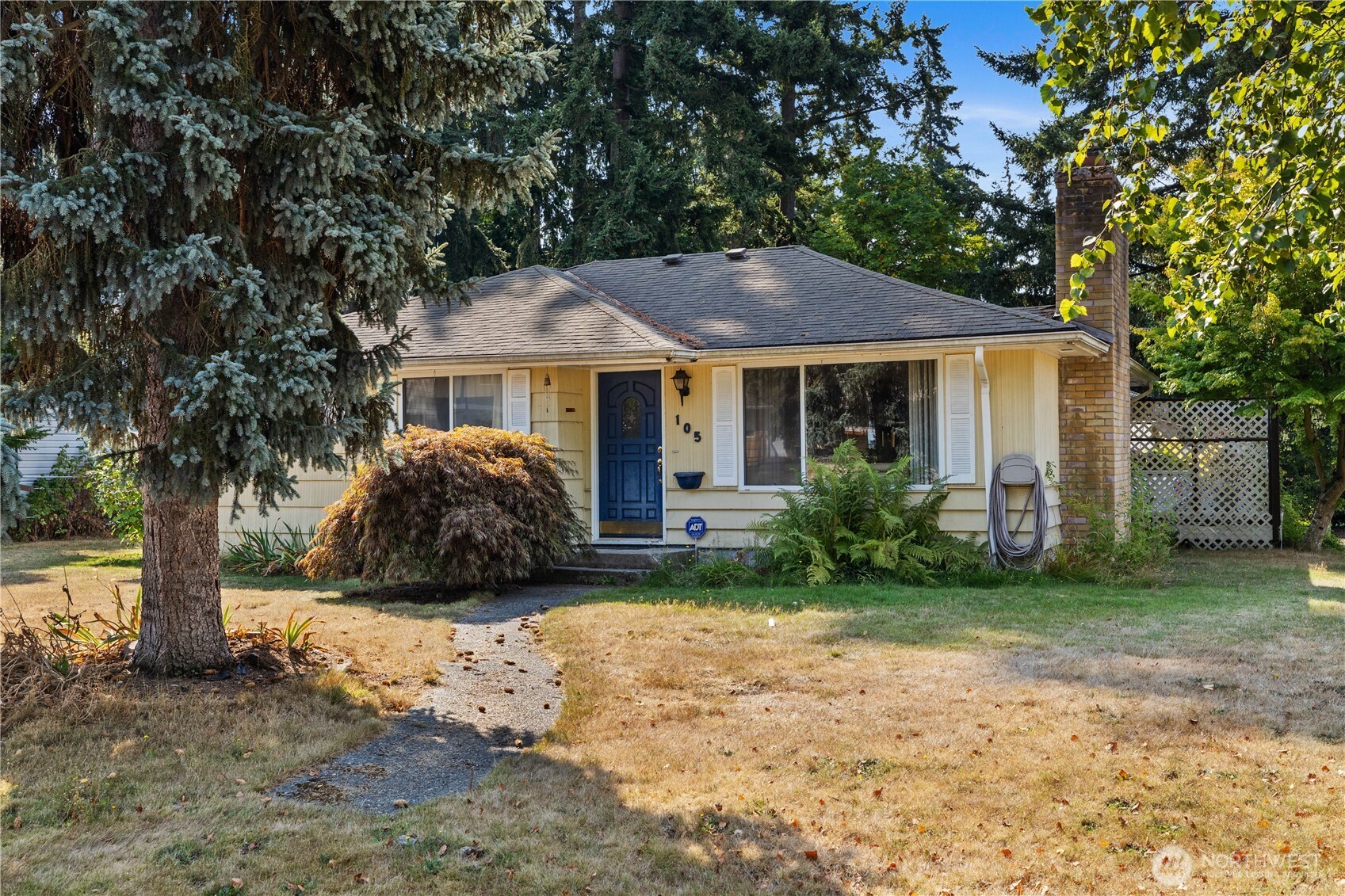 105 Northeast 180th Street Shoreline, WA 98155 - Photo 2 of 34 a house view with a outdoor space