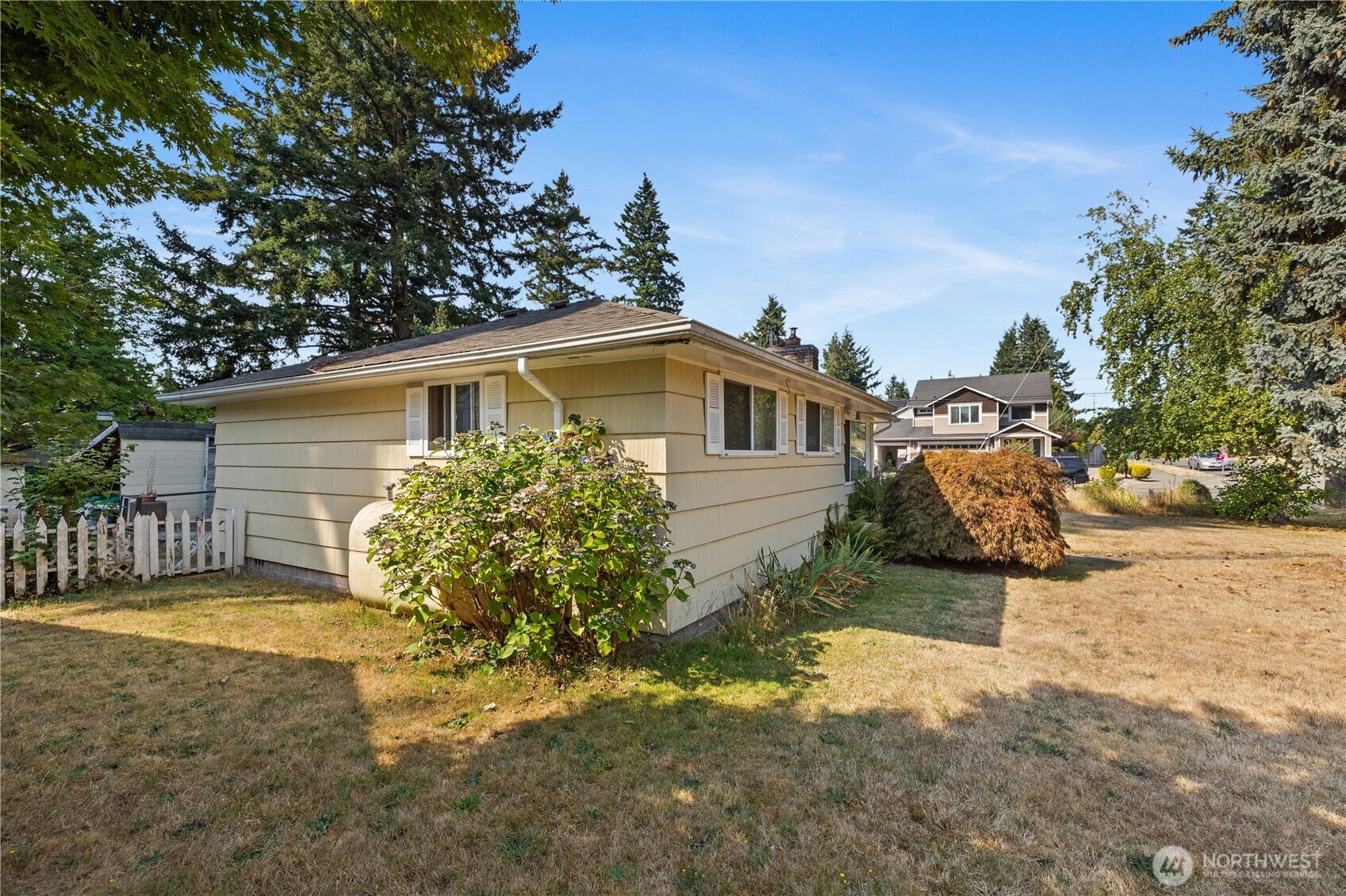 105 Northeast 180th Street Shoreline, WA 98155 - Photo 22 of 34 a view of a house with a yard