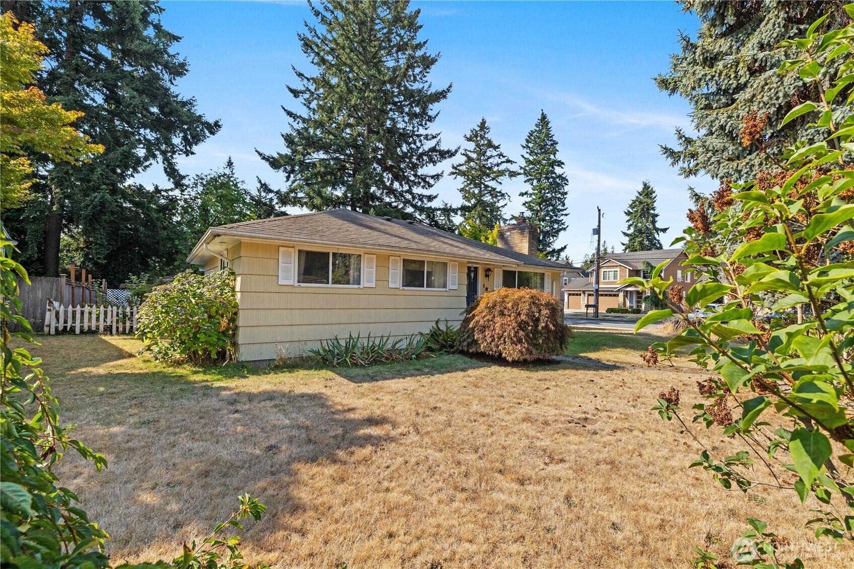105 Northeast 180th Street Shoreline, WA 98155 - Photo 23 of 34 a view of a house with a yard