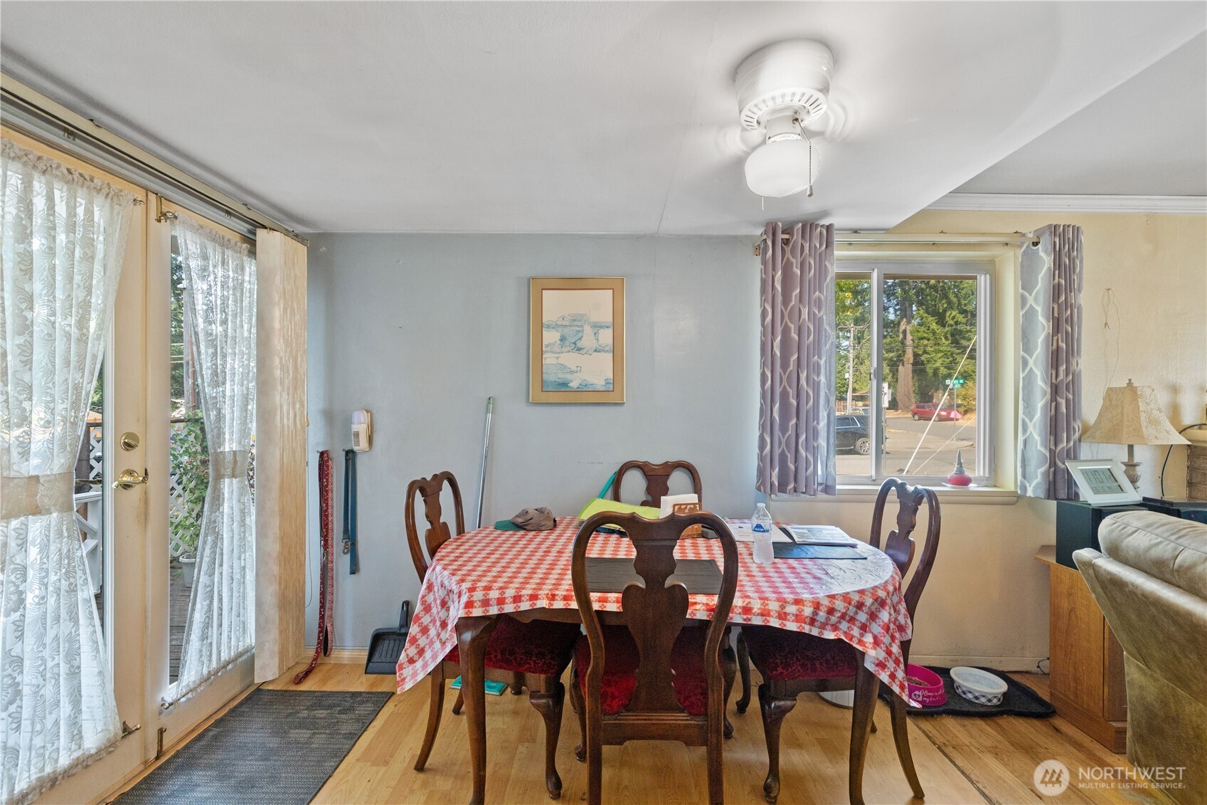 105 Northeast 180th Street Shoreline, WA 98155 - Photo 7 of 34 a view of a dining room with furniture window and outside view
