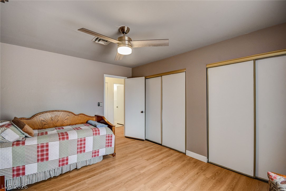 1401 Sharon Road Las Vegas, NV 89106 - Photo 51 of 73 Smooth wood floors and ample closet space define this comfortable bedroom.