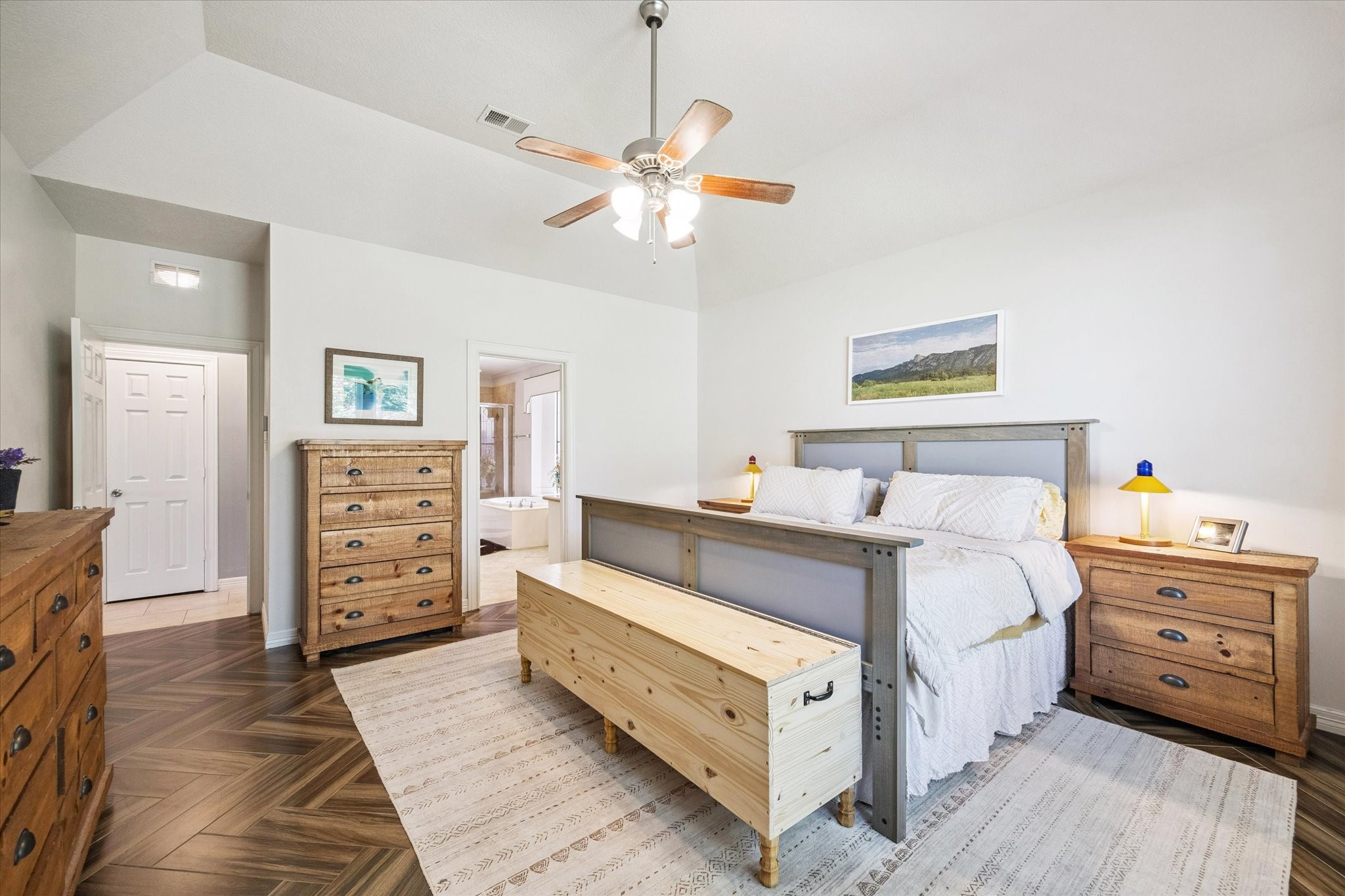 1118 Sherfield Ridge Drive Katy, TX 77450 - Photo 17 of 33 a bedroom with a bed and a chandelier