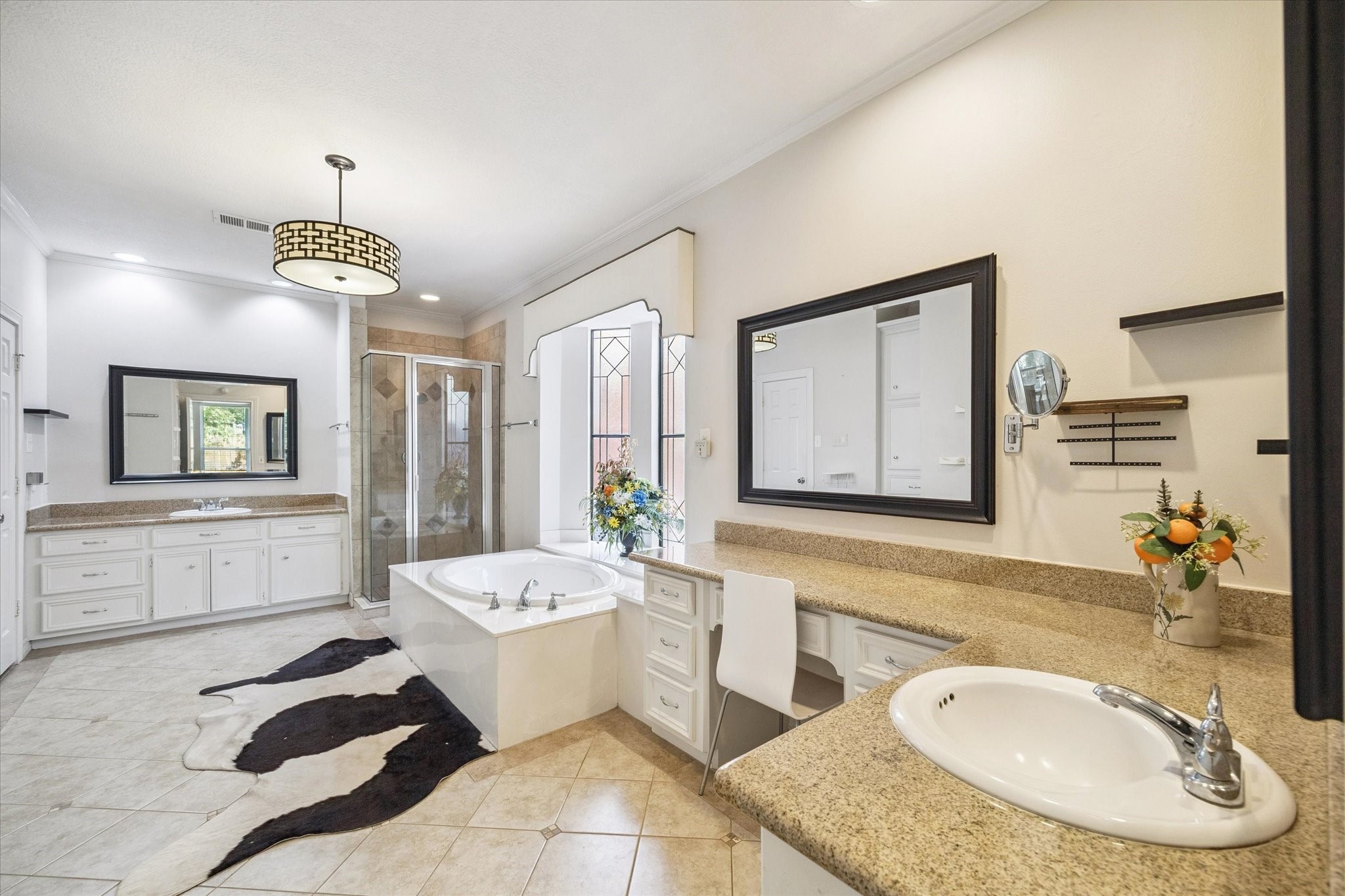 1118 Sherfield Ridge Drive Katy, TX 77450 - Photo 18 of 33 a bathroom with a granite countertop sink mirror and bathtub
