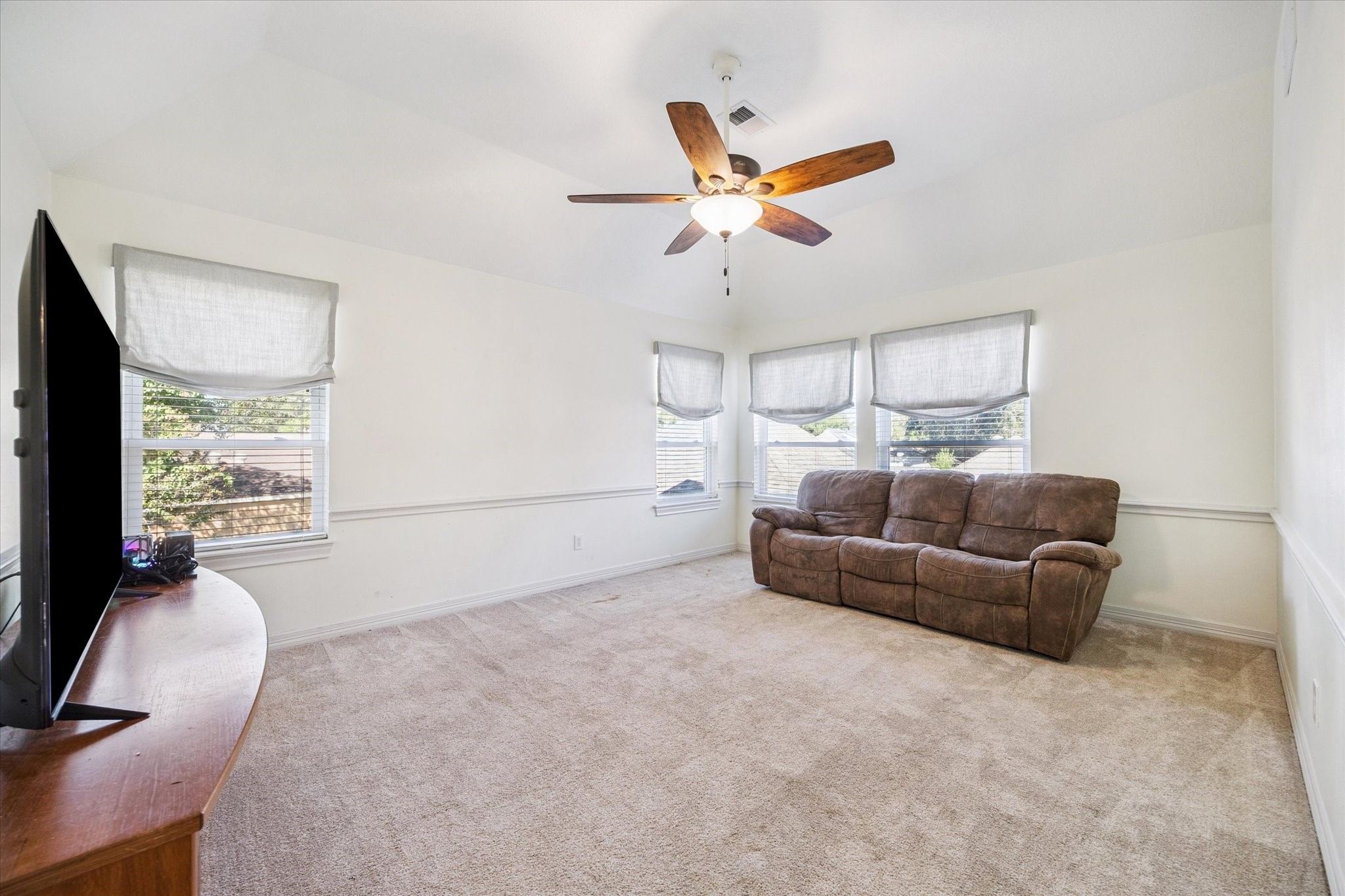 1118 Sherfield Ridge Drive Katy, TX 77450 - Photo 24 of 33 a bedroom with furniture and a window