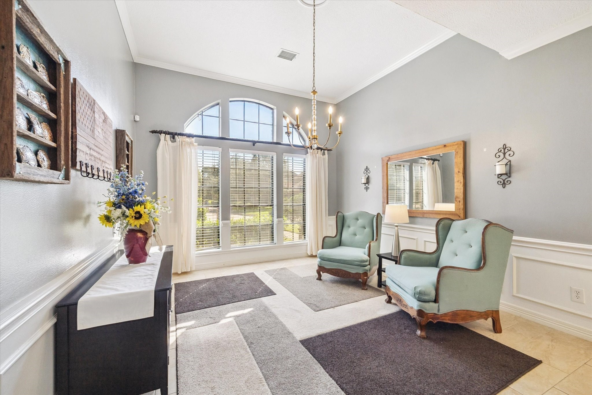 1118 Sherfield Ridge Drive Katy, TX 77450 - Photo 7 of 33 a living room with furniture and a chandelier