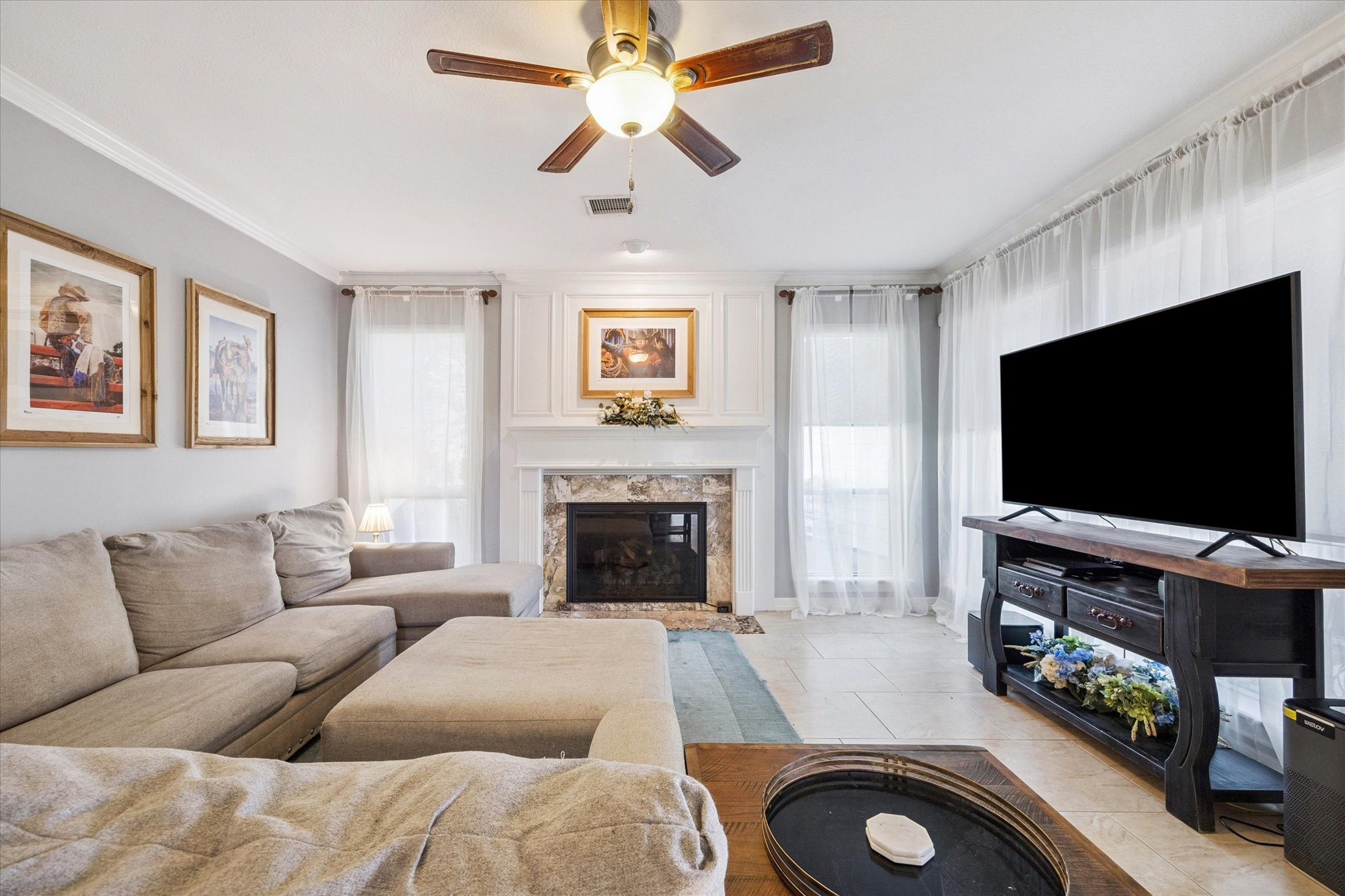 1118 Sherfield Ridge Drive Katy, TX 77450 - Photo 10 of 33 a living room with furniture and a flat screen tv