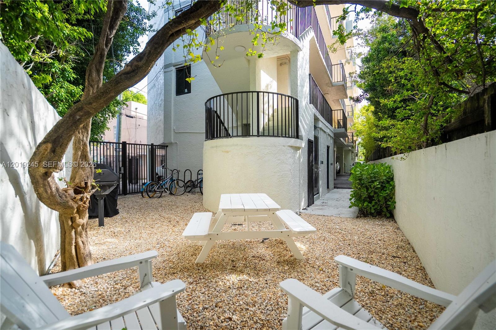 6960 Rue Vendome, Unit 201 Miami Beach, FL 33141 - Photo 26 of 27 a view of outdoor space yard and patio