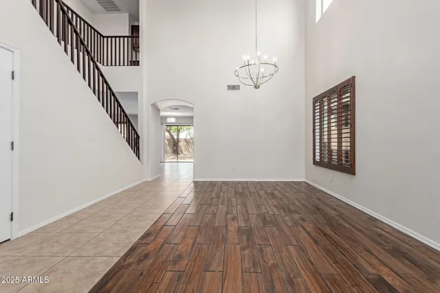 a view of an entryway with wooden floor