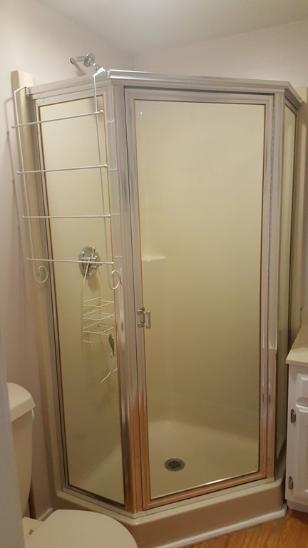 206 Cadmans Neck Road, Unit VAC RENTAL Westport, MA 02790 - Photo 11 of 24 a bathroom with a glass door shower