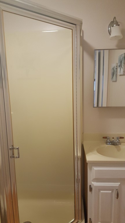 206 Cadmans Neck Road, Unit VAC RENTAL Westport, MA 02790 - Photo 14 of 24 a bathroom with a shower and a sink