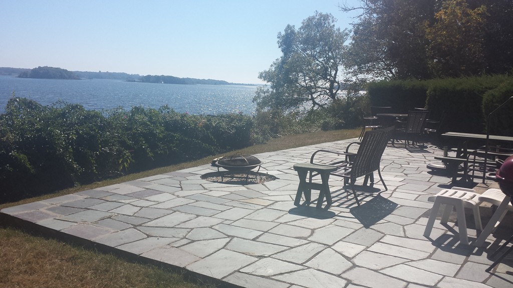 206 Cadmans Neck Road, Unit VAC RENTAL Westport, MA 02790 - Photo 18 of 24 a view of a terrace with furniture and a yard