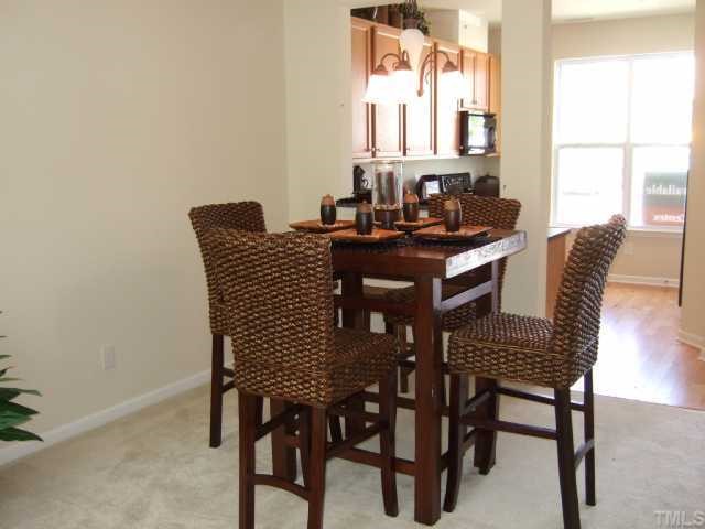 2932 Casona Way Raleigh, NC 27616 - Photo 3 of 12 a dining room with furniture and window