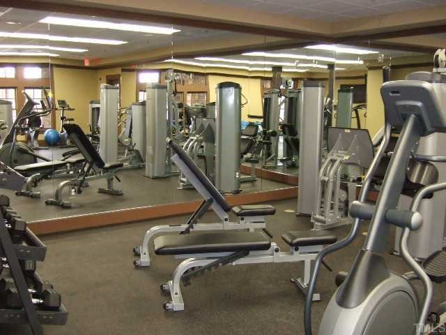 2932 Casona Way Raleigh, NC 27616 - Photo 6 of 12 a view of a room with gym equipment