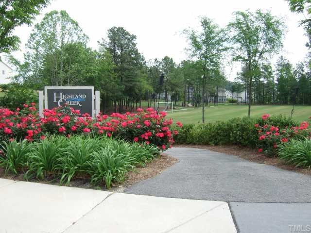 2932 Casona Way Raleigh, NC 27616 - Photo 9 of 12 a view of a garden with flowers