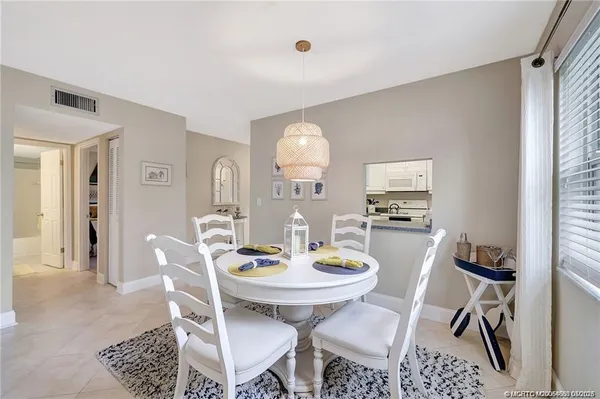 a view of a dining room with furniture