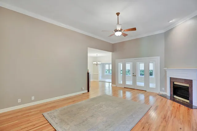 a large kitchen with stainless steel appliances granite countertop a refrigerator and a sink